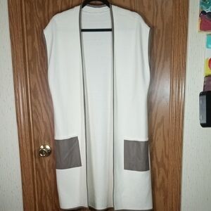 Chicos,Cream Sleeveless Cardigan with Brown Faux Leather Accents.